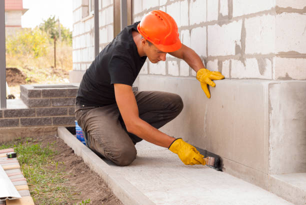 Waterproofing professionals working in Long Beach, IN